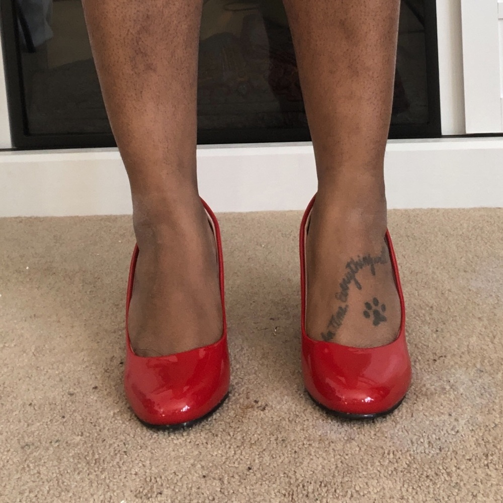 Never Worn!!! Red patent leather pump.